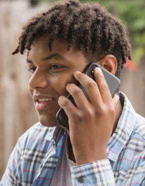 Young man speaking on cell phone
